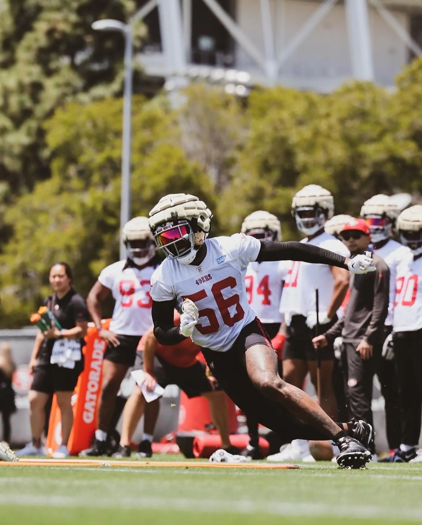 San Francisco 49ers players taking part in a training drill