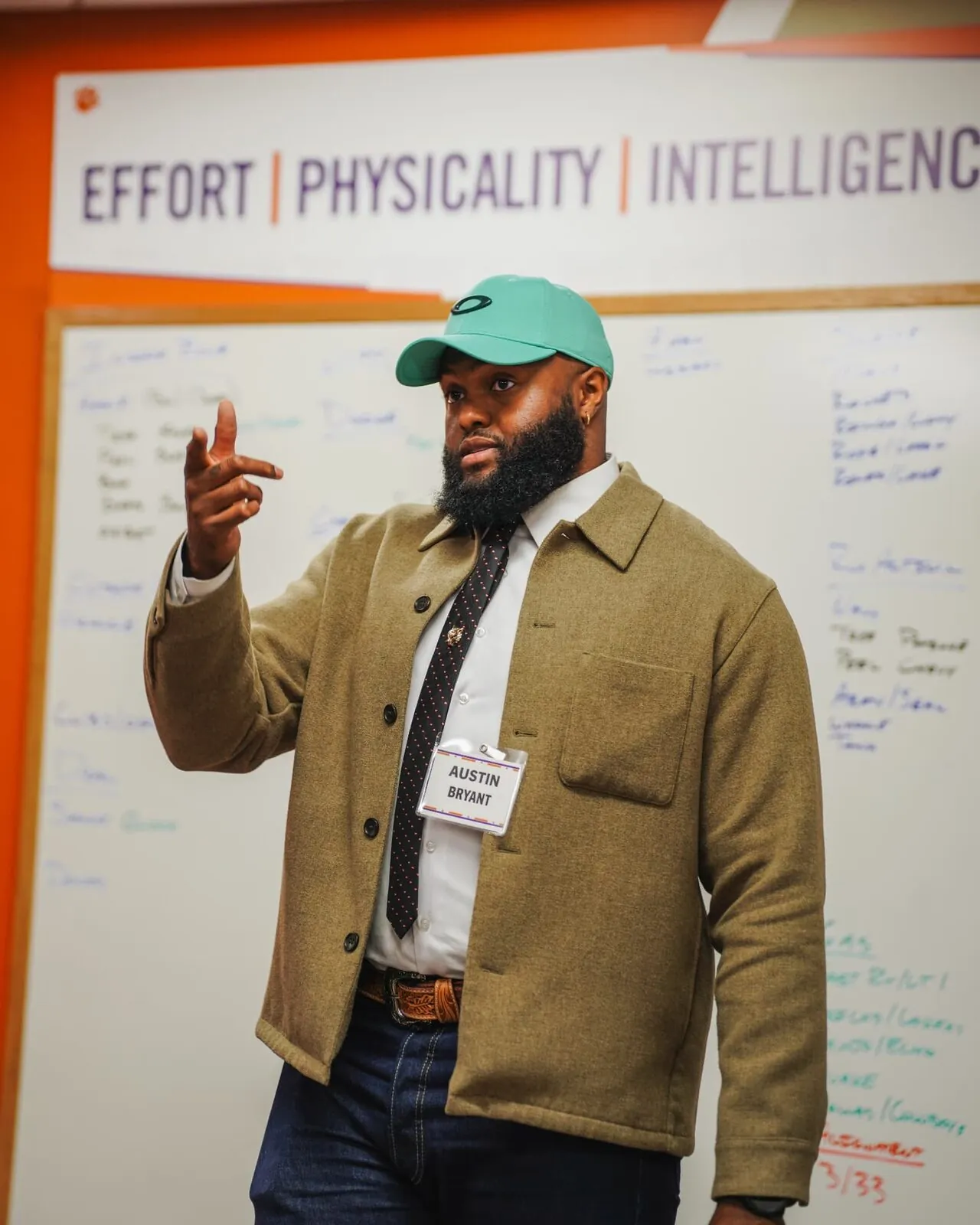 Austin Bryant speaking to Clemson players in a P.A.W. Journey session