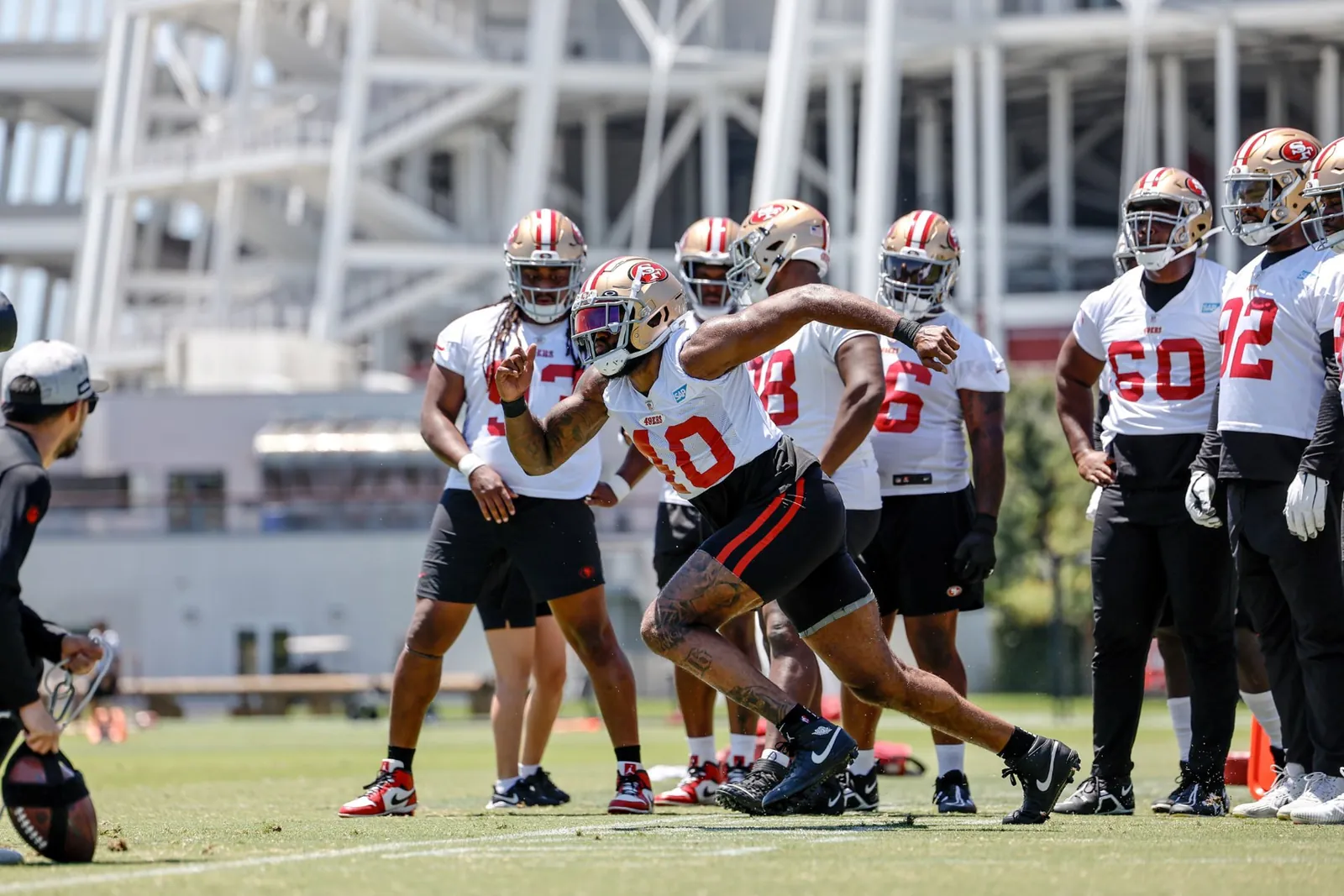 Austin Bryant wearing number 90 during a San Francisco 49ers practice drill